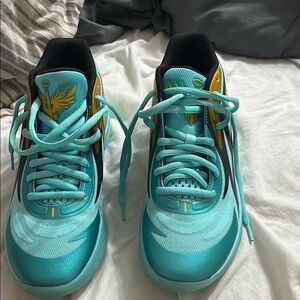 Melo teal basketball shoes